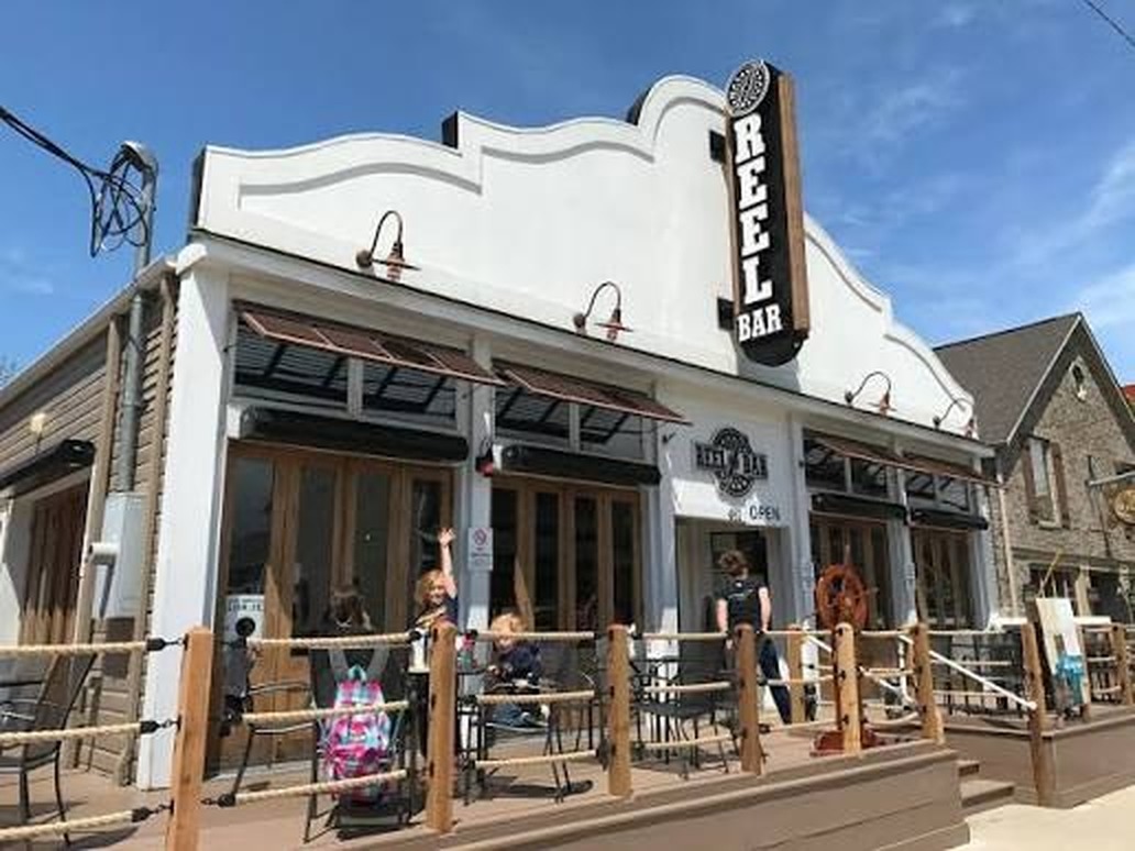 Street view of Reel Bar exterior on Catawba Avenue